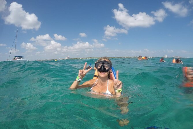 Private Boat Unlimited Party to Isla Mujeres + Transfer - Exploring Isla Mujeres: Downtown, Playa Norte, and Free Time