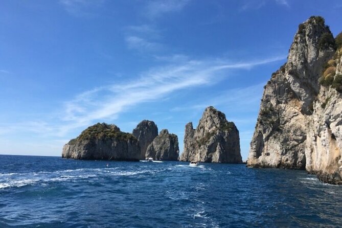 Private Capri Luxury Boat Experience: Cruise, Swim & Sunbathe - Visiting Capri’s Famous Grottos and Hidden Coves