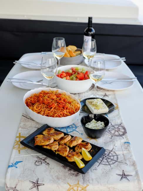 Private Catamaran Cruise in Santorini and BBQ Drinks - Soaking in the Volcanic Hot Springs