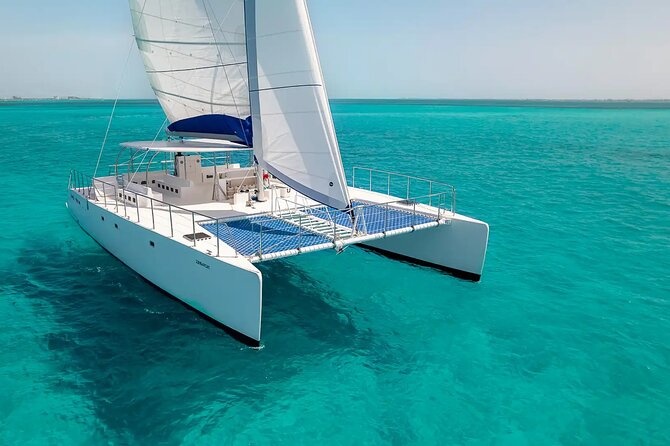 Private Catamaran from Cancun to Isla Mujeres | For up to 100 pp - Relaxing at Playa Norte in Isla Mujeres