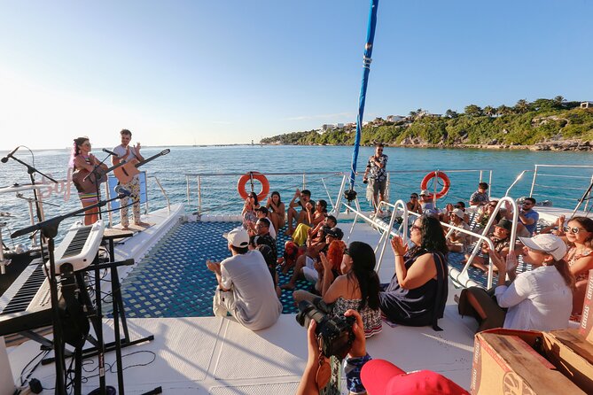 Private Catamaran from Cancun to Isla Mujeres | For up to 100 pp - Sailing Back to Cancun and Sunset Views