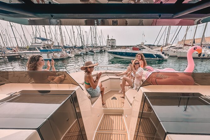 Private catamaran sailing experience around Barcelona - The Experience: Snacks, Music, and Sunbathing