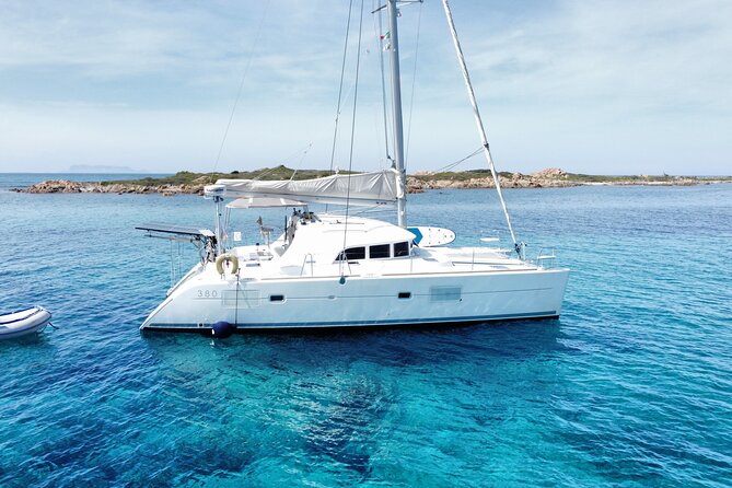Private catamaran sailing trip around La Caletta -Berchida - Sardinia - Logistics: Meeting Point and Departure Details