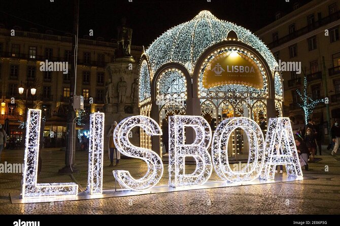 Private Christmas Lights Tuk Tuk Tour in Lisbon - Passing the Santa-Decorated Elevator in Bairro Alto
