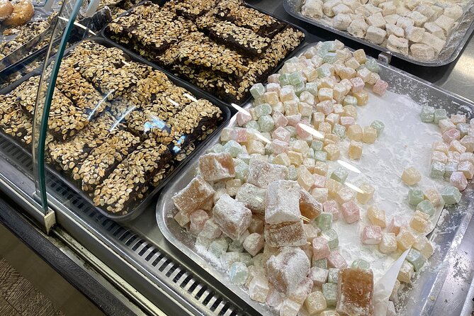 Private Christmas Walking Tour in Athens with Food & Drinks - Strolling Along Ermou Street for Christmas Shopping and Street Food