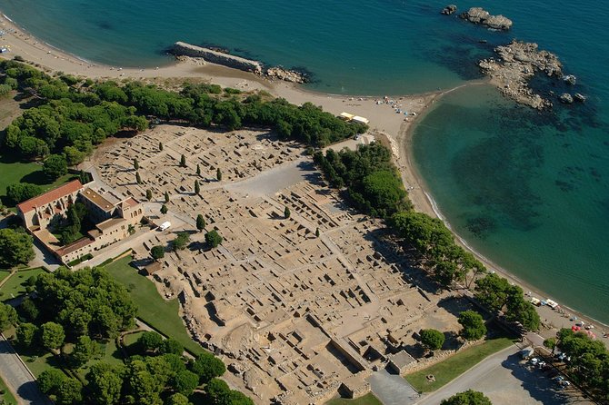 Private Costa Brava and Empuries Tour with Hotel Pick-Up and Panoramic Boat Ride - Exploring Empuries: Greek and Roman Ruins