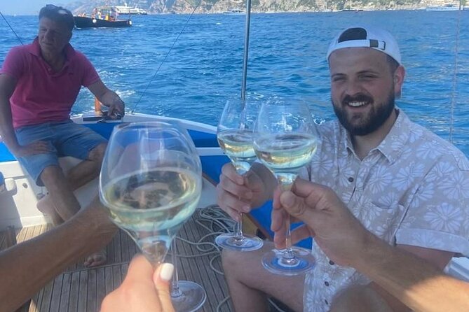 Private day aboard a typical boat from Positano to Amalfi - Exploring the Emerald Grotto: Nature’s Light Show