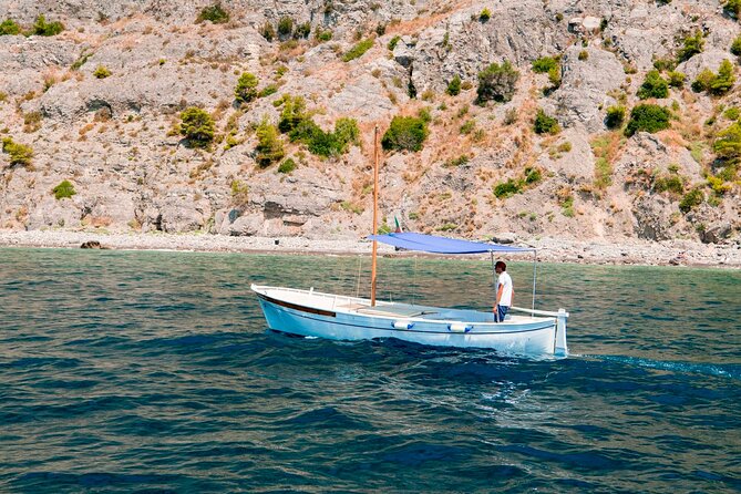 Private Day on the Island of Capri with Departure from Positano - Passing Between the Faraglioni Rocks