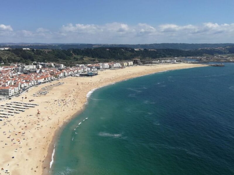 Private Day Tour Medieval Obidos, Nazare wave & Peniche Surf - Serene Escape at Buddha Eden Oriental Garden