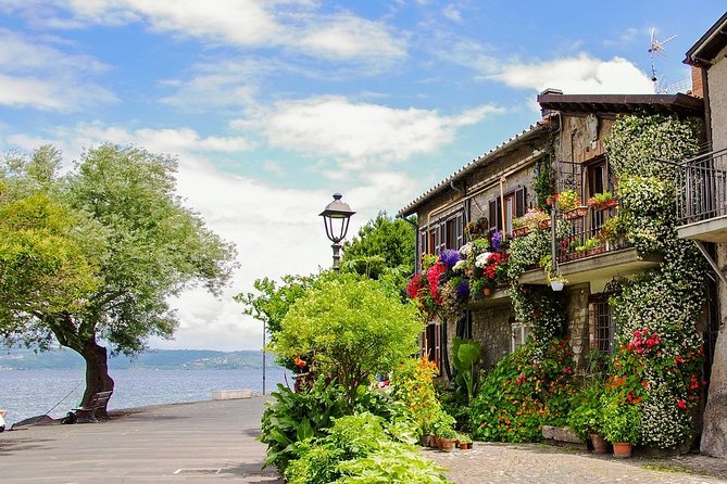 Private Day Trip from Rome: Bracciano Lake and Surrounding Areas - Visiting Calcata: Art, Bohemia, and Medieval Charm