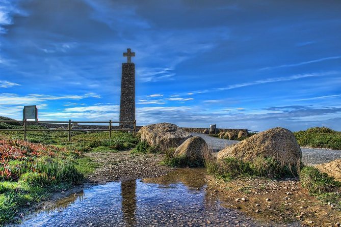 Private Day Trip to Sintra and Cascais with Pena Palace entrances - Standing at the Edge of Europe at Cabo da Roca