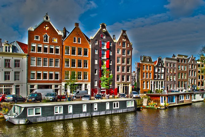 Private departure transfer from Amsterdam to Schiphol Airport (AMS) - Convenient Departure from Your Accommodation in Amsterdam