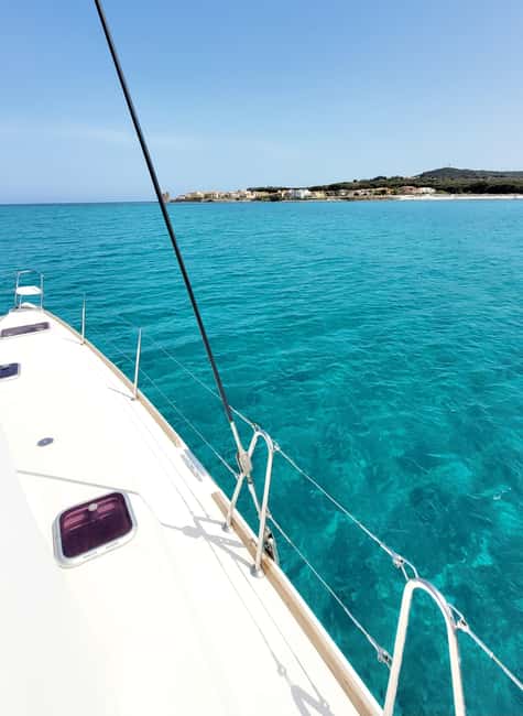 Private exclusive catamaran sailing trip Sardinia from La Caletta - The Sailing Experience and Crew Dynamics