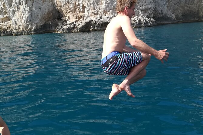 Private Fishing and Capri tour with lunch from Sorrento - Relaxing at Punta Carena Lighthouse and Swimming Breaks