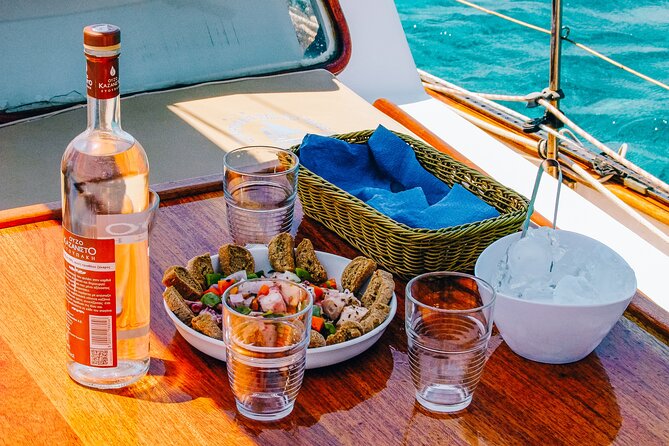 Private Full Day Tour in South Paros Caves Despotiko - Onboard Lunch: Greek Flavors at Sea