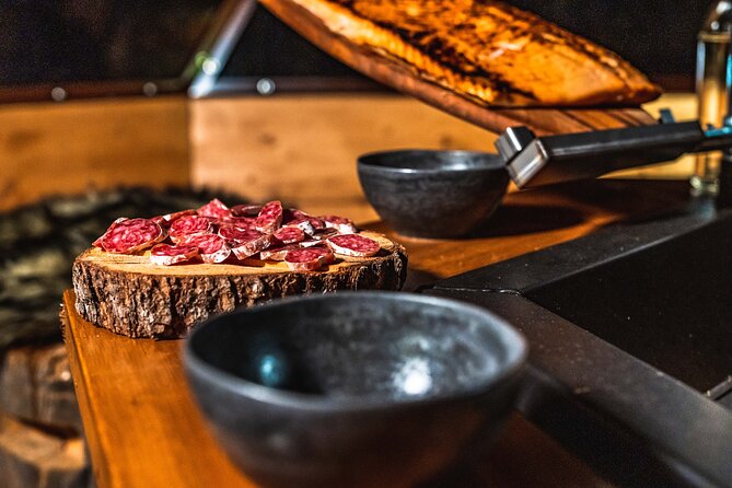 Private Glass Igloo Dinner on the Shore of Frozen Lake - The Northern Lights Hunt on a Frozen Lake with Snow Scooters