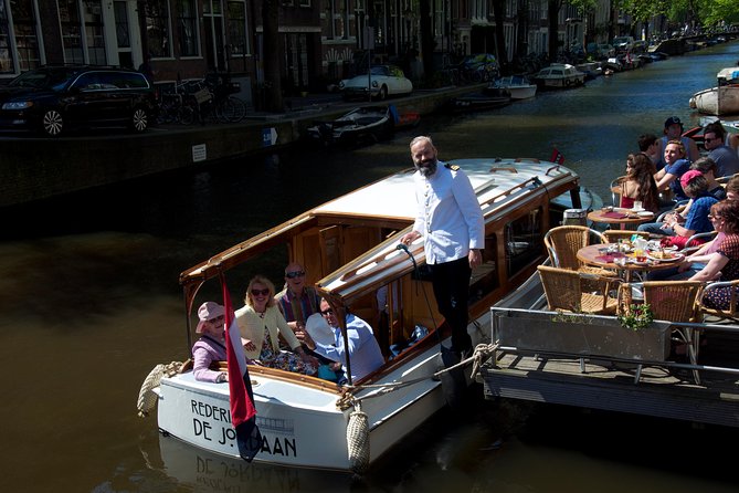 Private Guided Historic Amsterdam Canal Cruise in a Salon Boat - The Luxurious Setting of the Salon Boat