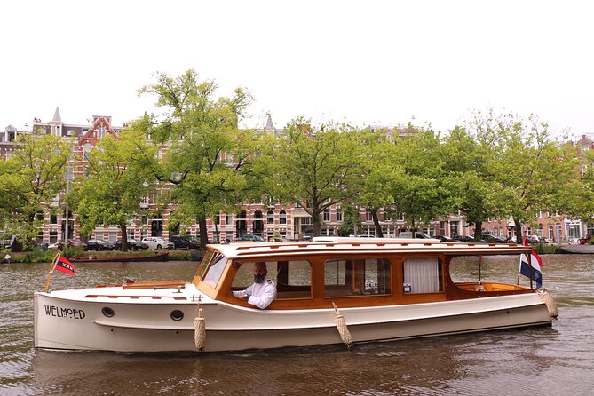 Private Guided Historic Amsterdam Canal Cruise in a Salon Boat - The Experience of a Private, Uncrowded Tour