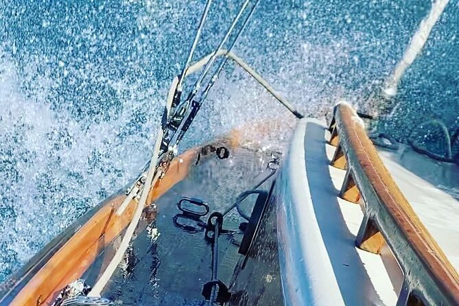 Private Guided Sailing Boat Tour on Lake Como with Aperitif - The Hosts: Tiziano and Roberta’s Passion for Lake Como