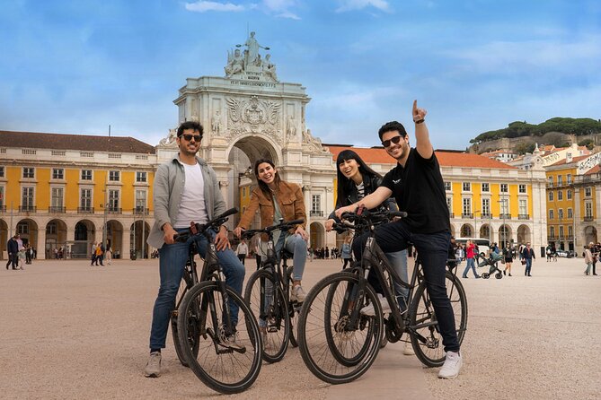 Private Lisbon 360º Guided Tour: Boat Trip, Bike, Walk & Tramway - Riding the Iconic Lisbon Tram and Cycling to Belém