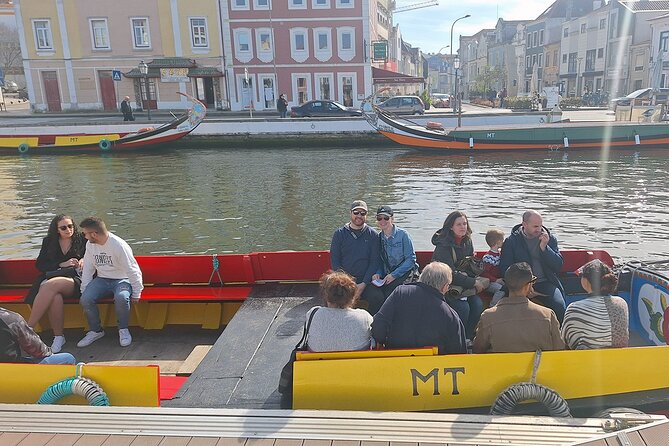 Private Lisbon to Porto tour - Scenic Stops - Electric Vehicle - Costa Nova: A Picture-Perfect Scene of Striped Houses