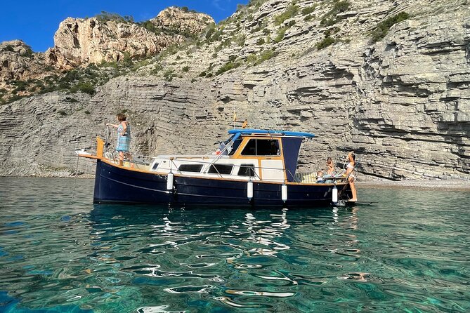 Private Mediterranean classic boat with Paddle boards+Snorkelling - What’s Not Included: Food and Drinks