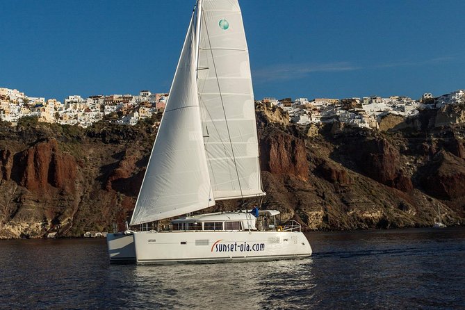 Private Morning Tour Lagoon 400-380 Sailing in Santorini ,lunch, drink, transfer - Key Points