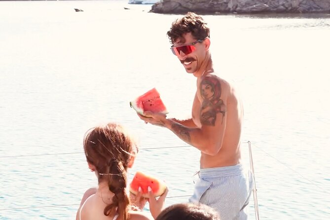 Private Mykonos Catamaran Day Cruise with Meals & Water Toys - Starting the Day: Departure from Mykonos New Port