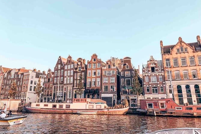 Private Romantic Canal Cruise Amsterdam with Bubbly and Snacks - Scenic Routes and Notable Stops Along the Canals