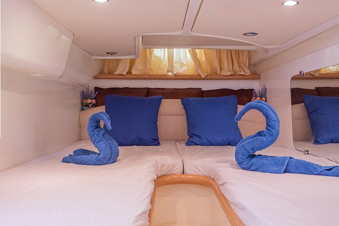 Private Romantic Dinner on a Yacht + 1 Night for 2 People - Night Sailing and Barcelona’s Illuminated Coastline