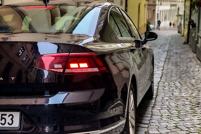 Private ROUND-TRIP (FROM and TO the AIRPORT) by LIMOUSINE 3+1pax - From Prague Airport to Your Hotel: Seamless Arrival Service