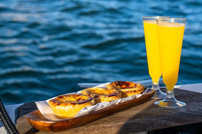 Private sailboat tour in Lisbon - Passing Under the Ponte 25 de Abril Bridge