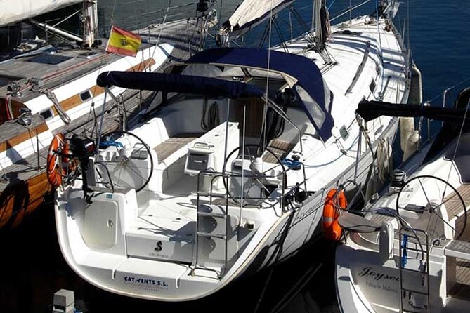 Private sailing and paddlesurfing tour with skipper up to 11 people - Barceloneta Beach: The Heart of Barcelona’s Coastal Life