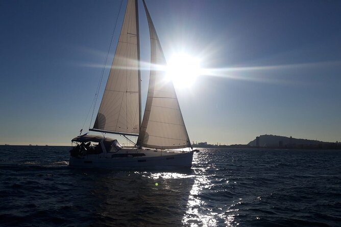 Private sailing and paddlesurfing tour with skipper up to 11 people - Exploring Parc del Fòrum from the Water