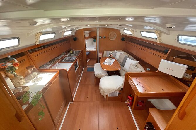 Private Sailing with SUP, Drinks and Appetizers from Barcelona - The Columbus Monument and Coastal Charm