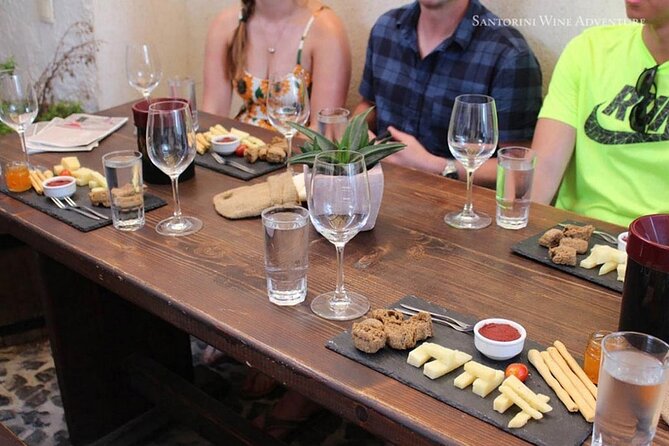 Private Santorini Wine Tour with 12 Wine Tastings and Greek Meal - Key Points