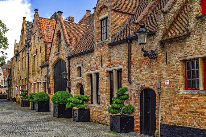 Private sightseeing roundtrip transfer to Bruges from Amsterdam - Hassle-Free Pickup and Drop-Off in Amsterdam
