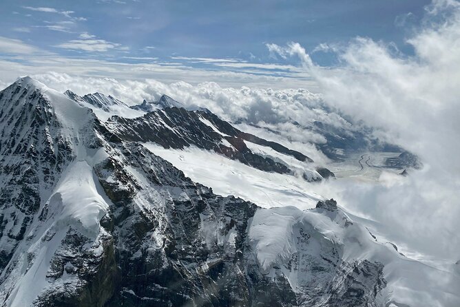 Private Swiss Alps helicopter tour over snow covered mountain peaks and glaciers - Flying Past the Eiger’s North Face