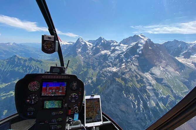 Private Swiss Alps helicopter tour over snow covered mountain peaks and glaciers - The Unique Beauty of Lake Thun and Lake Brienz