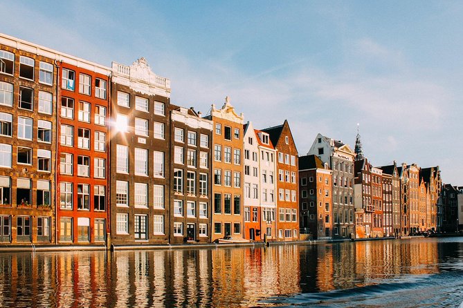 Private Tour: Amsterdam's City Highlights and Hidden Gems - Strolling Along the Canal Ring: The Wealthy Merchants’ Residences