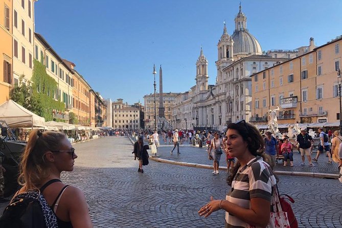 Private Tour - City Center - Passing by the Roman Temple at Piazza di Pietra