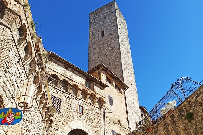 PRIVATE TOUR: Full-Day Volterra & San Gimignano with Wine Tasting Experience - Savoring Tuscan Wines and Oils