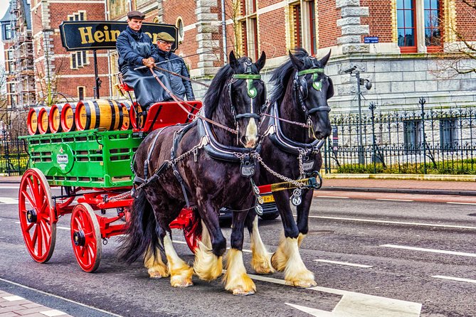 Private Tour Guide Amsterdam with a Local: Kickstart your Trip, Personalized - Iconic Landmarks: Dam Square and the Red Light District