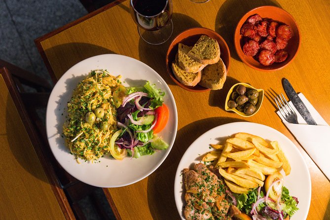 Private Tour: Lisbon Sunset Walking Tour with Fado Show and Dinner - Walking Through Alfama’s Nighttime Charm