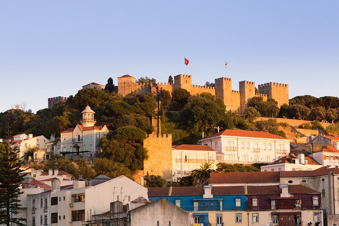 Private Tour: Lisbon Sunset Walking Tour with Fado Show and Dinner - Enjoying a Traditional Portuguese Dinner with Fado