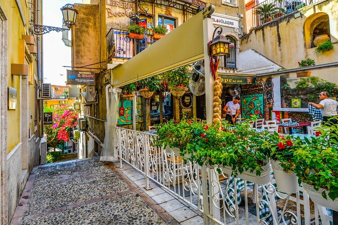Private Tour of Taormina from hotel or cruise port in Messina - Strolling Along Corso Umberto and Historic Gates
