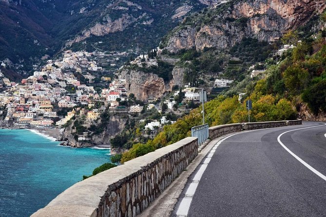 Private Transfer: From Amalfi (hotel) to Naples (hotel-airport-train station) - Practical Details: Booking, Luggage, and Duration