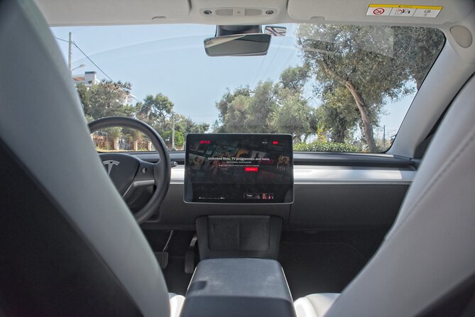 Private Transfer from Athens Airport to Athens City with Tesla - Starting Point at Athens International Airport