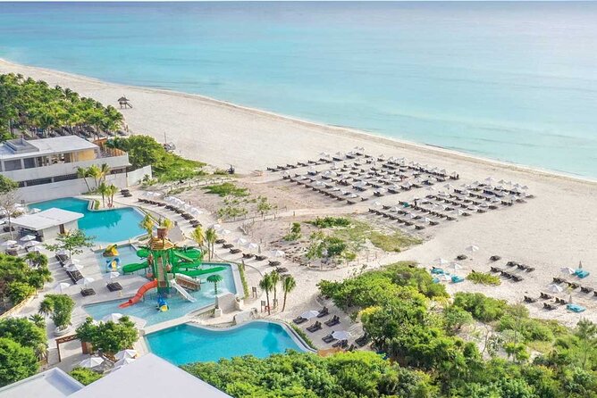 Private Transfer From/To Cancun Airport and Sandos Playacar Beach - Effortless Transportation Between Cancun Airport and Sandos Playacar Beach Resort for Groups Up to 5