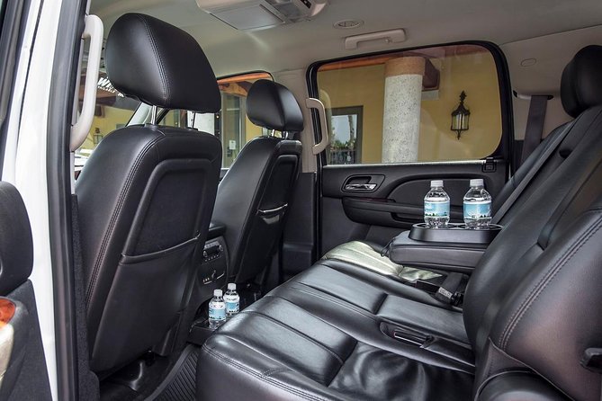 Private transfer round trip Vallarta Airport to your hotel in a luxury vehicle - Meeting Point at Vallarta Airport